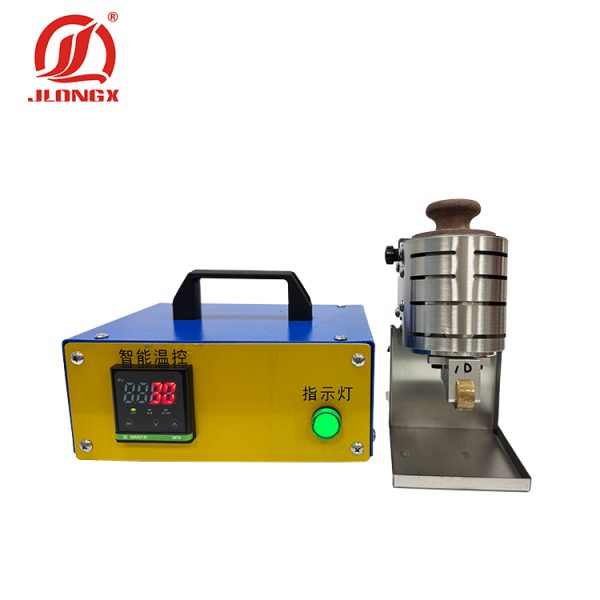 Handheld hot melt adhesive roller